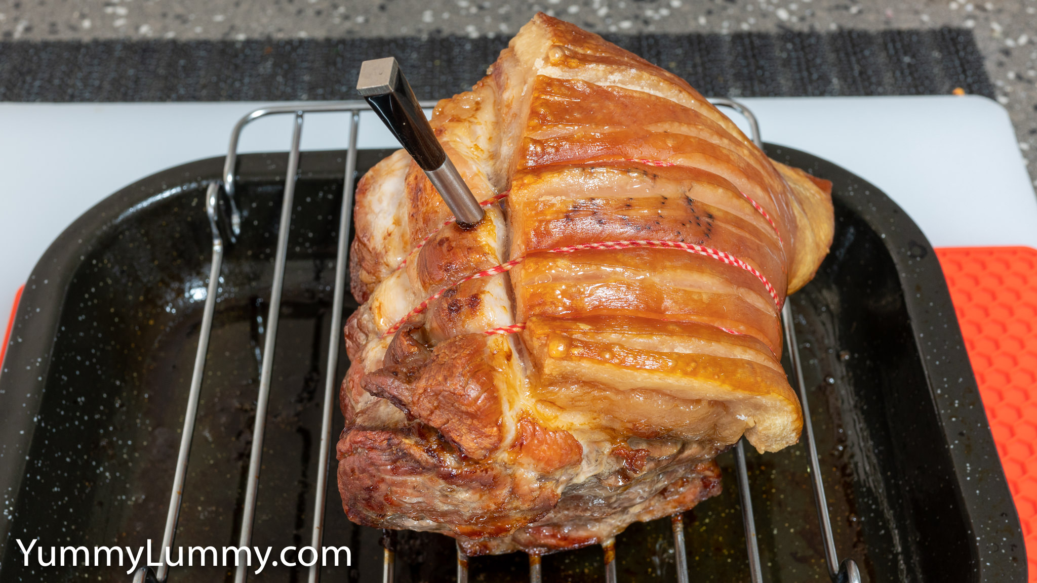 rolled pork shoulder with a mango and nectarine