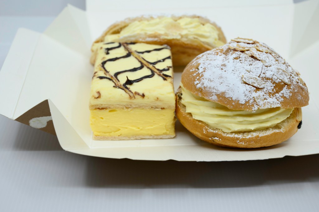 Pastries from Perryman's Artisan Bakery. Apple turnover, Bee sting bun, and Vanilla slice.