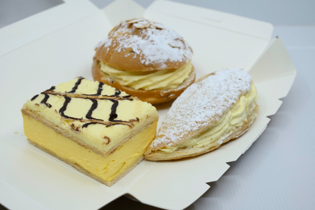 Pastries from Perryman's Artisan Bakery. Apple turnover, Bee sting bun, and Vanilla slice.