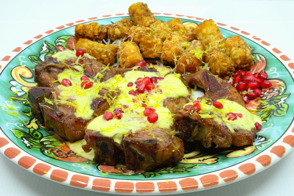 Local South Australian lamb chops cooked on a Weber Q+ grill with potato gems cooked in beef fat. Served with blue vein cheese sauce with pomegranate arils and lemon zest.