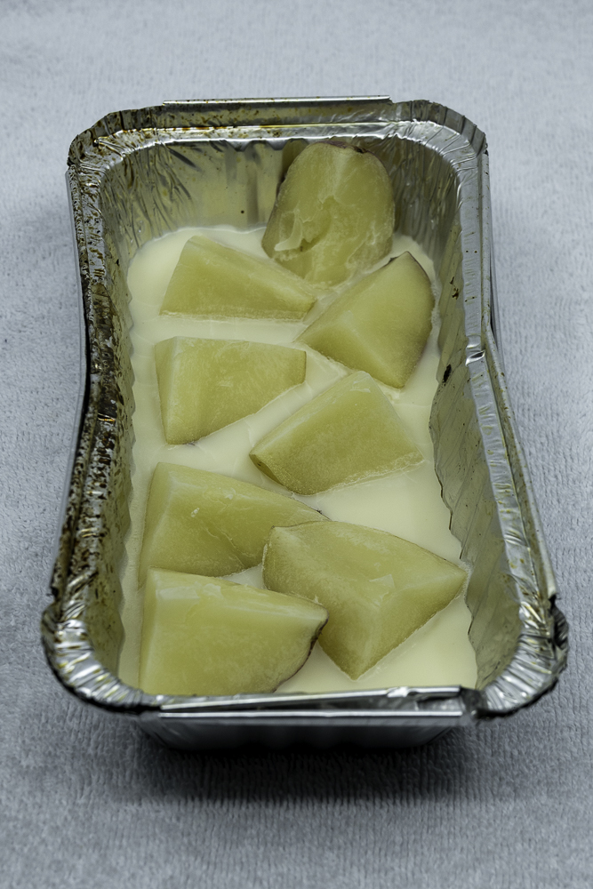 Parboiled and frozen potato in beef fat