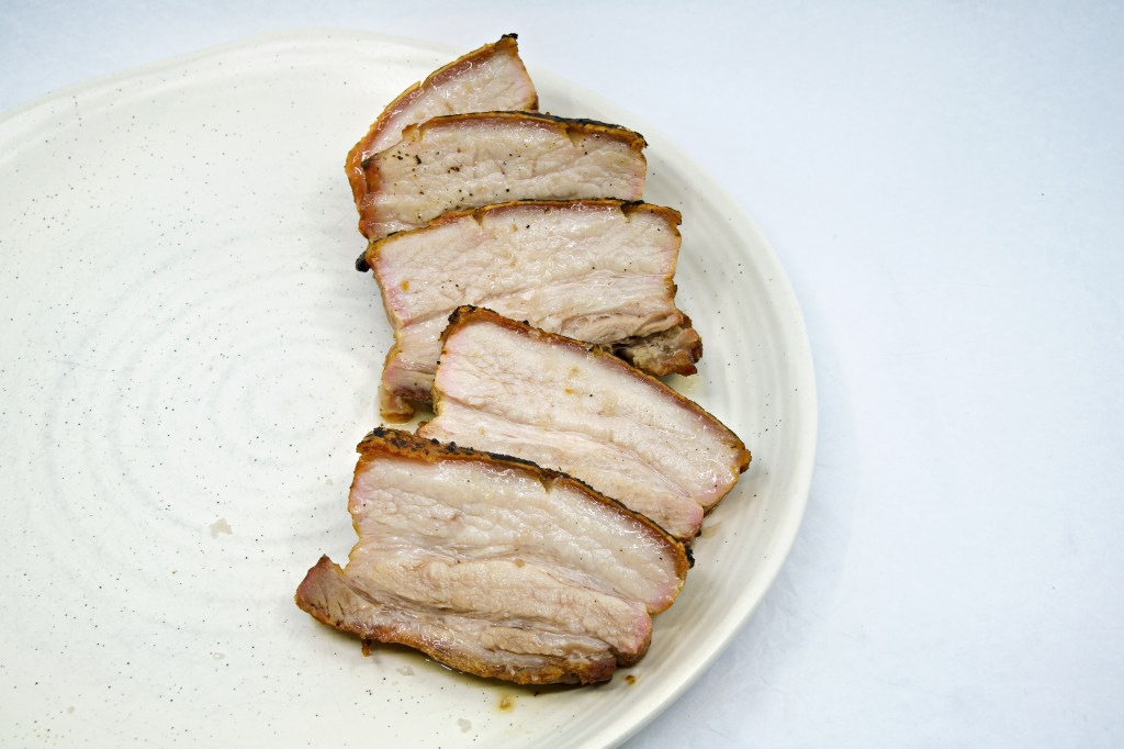 Cut slices of barbecue pork belly