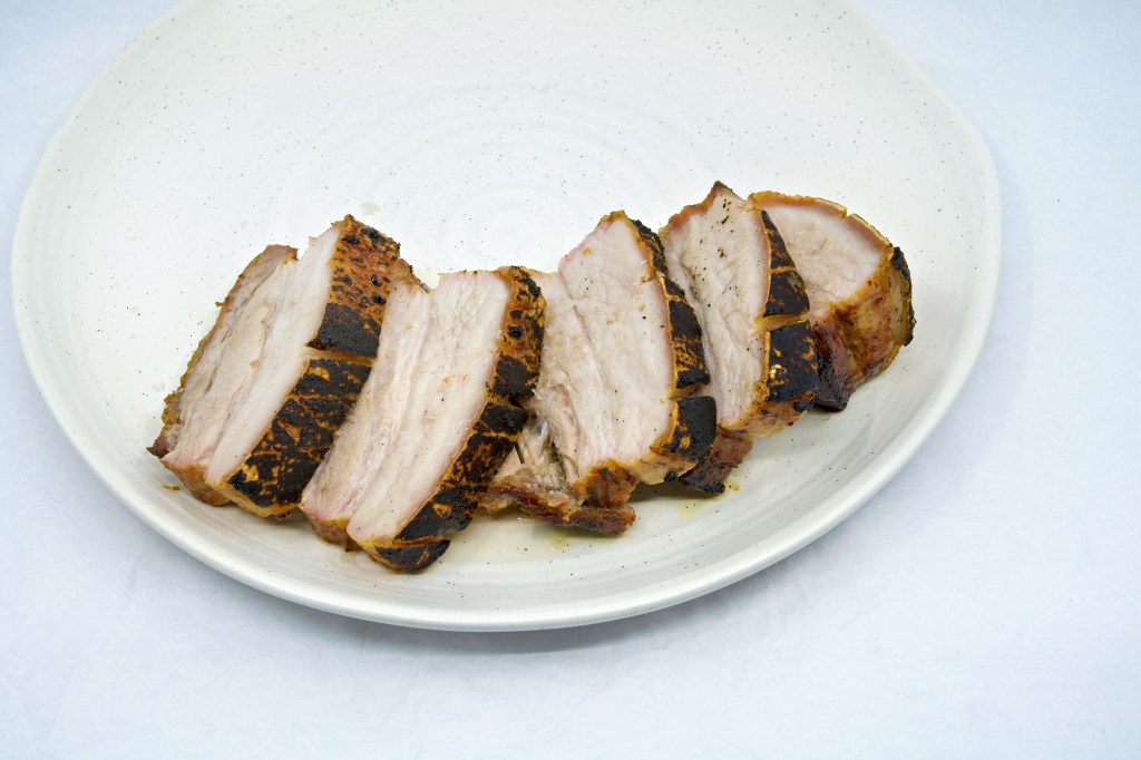 Cut slices of barbecue pork belly