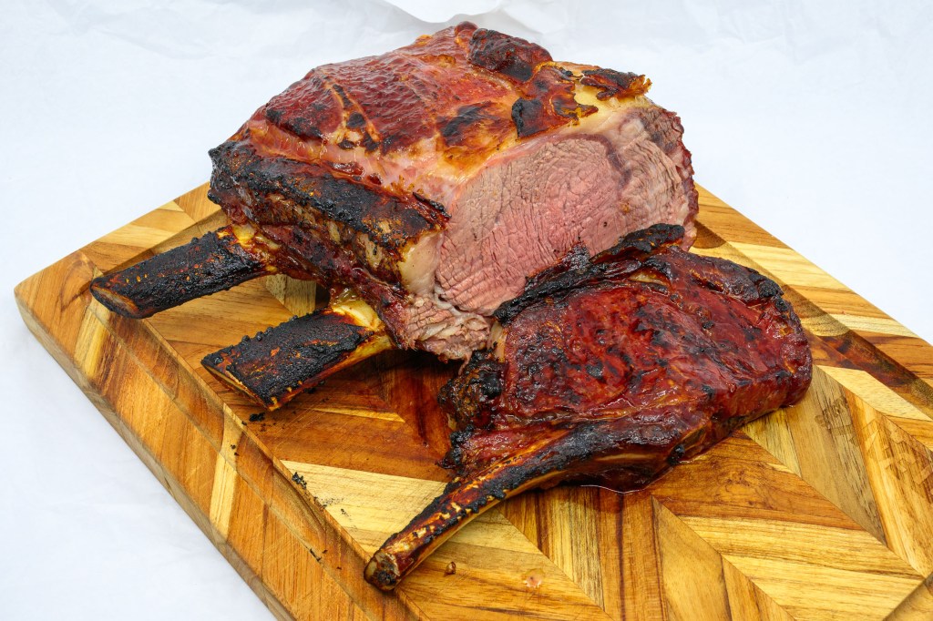 Standing rib roast cooked and carved