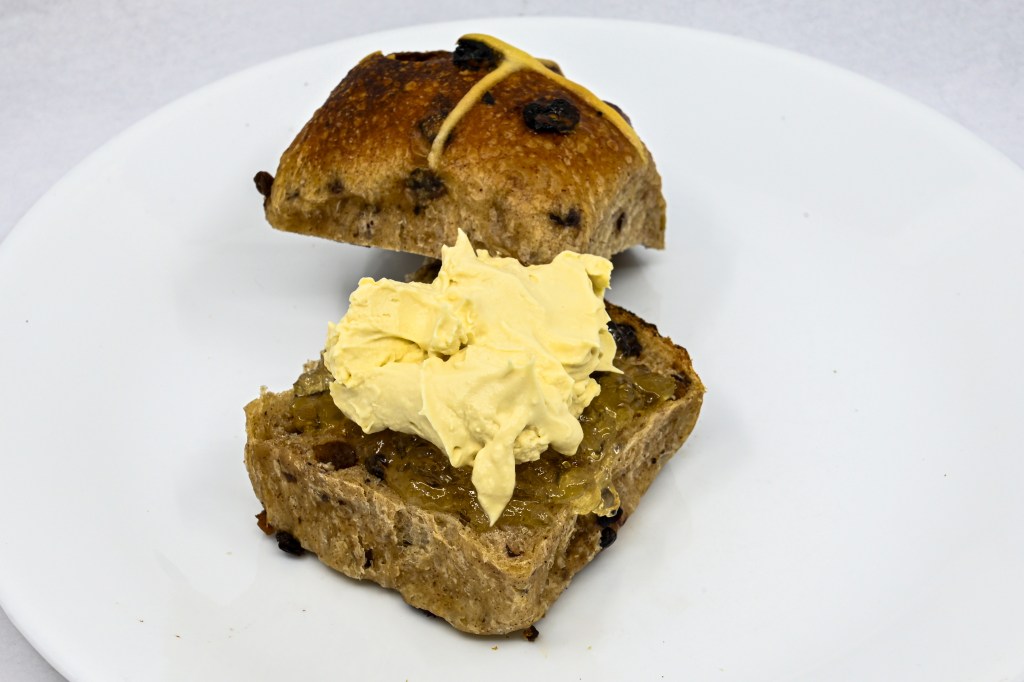 Perryman’s Bakery sourdough hot cross bun with Fleurieu Pouring Cream and Buderim Ginger Marmalade. Combining the excellence of Queensland with some South Australian fare.