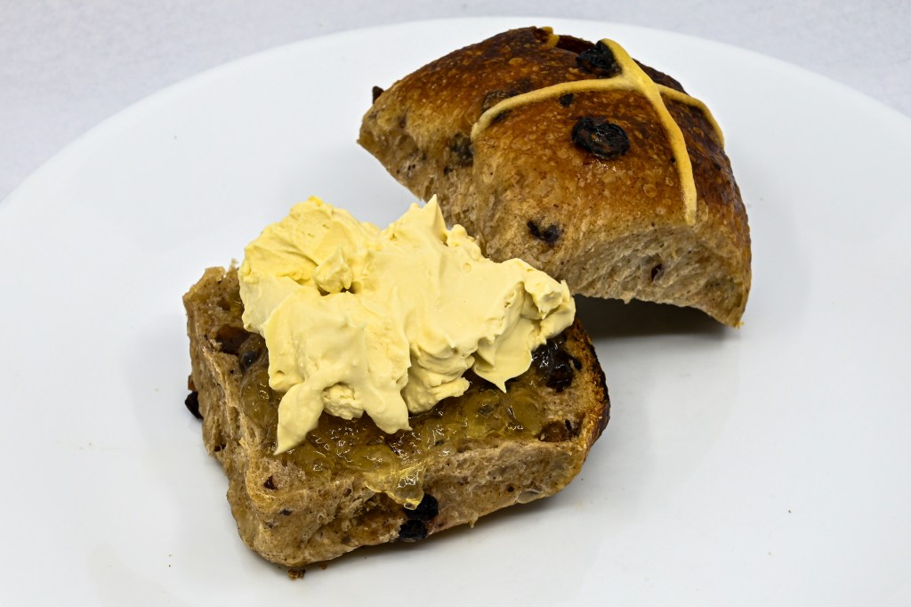 Perryman’s Bakery sourdough hot cross bun with Fleurieu Pouring Cream and Buderim Ginger Marmalade. Combining the excellence of Queensland with some South Australian fare.