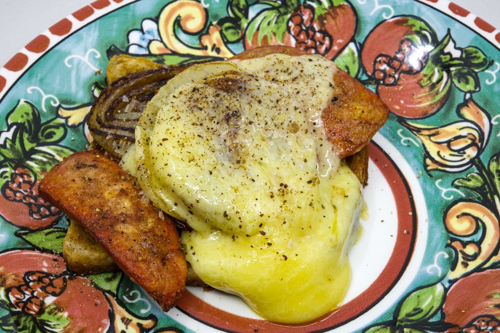 I submitted a postal vote for the South Australian election today. I made a democracy sausage. A slice of white sourdough bread with a generous layer of whipped Vegemite butter for lubrication and umami. One kransky and cheese sausage cut longitudinally and then bisected. Cooked on a cast-iron flat-top in the Weber Q+. A couple of slices of brown onion. Cooked on a cast-iron flat-top in the Weber Q+. The sausage was loaded onto the bread, and then the onion, and then a couple of pieces of aged cheddar cheese. I finished it on the Weber Q+ with the hood down, so the cheese started to melt, and the sourdough was fried in beef fat and whipped Vegemite butter.