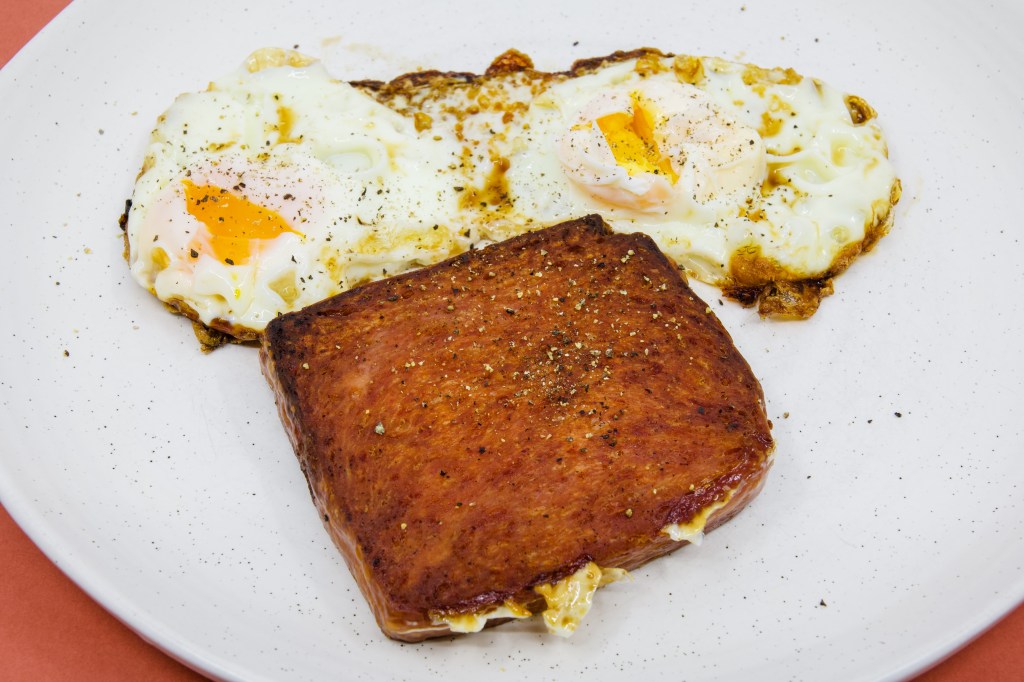 Spam and eggs fried in beef fat on the Weber Q+