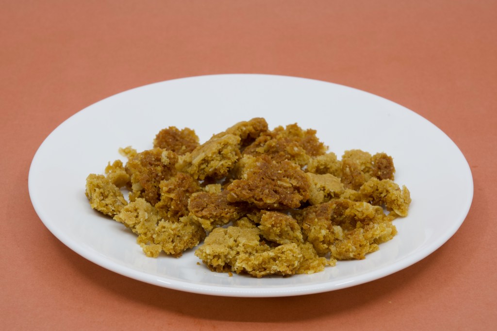 A photograph of crumbed Anzac biscuits from Perryman's Bakery