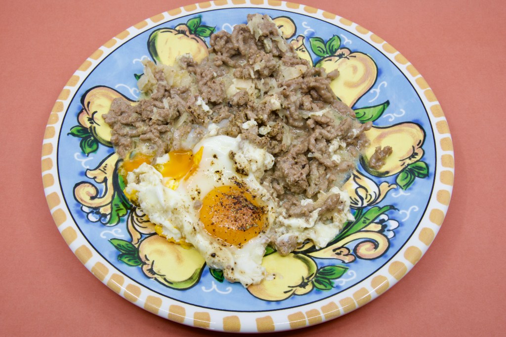 Beef mince cooked with Triple Cream Truffle Brie and Polish sauerkraut and a couple of eggs