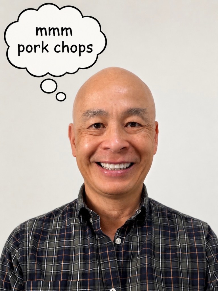 A photograph of me smiling with a cartoon bubble and the words "mmm pork chops."