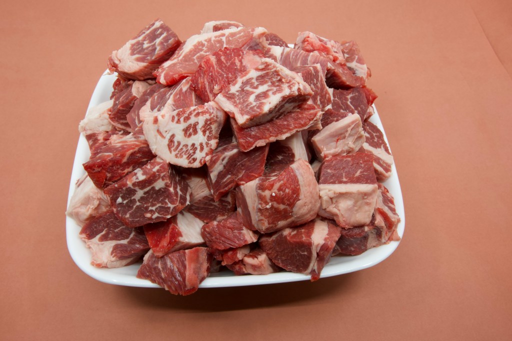 A little over 2.5 kg of beef short rib meat diced