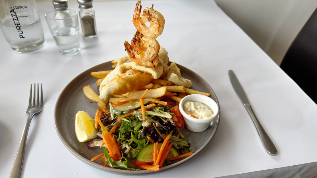 Secrets Trio King George Whiting, skewered prawns, and calamari at Secrets by the Sea