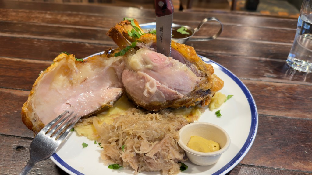 Hahndorf Inn crispy skin pork knuckle, sauerkraut, mustard, mashed potato, and gravy