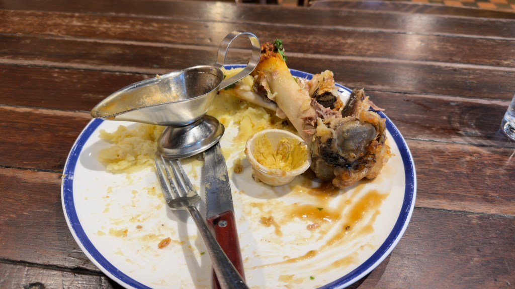 Hahndorf Inn crispy skin pork knuckle, sauerkraut, mustard, mashed potato, and gravy